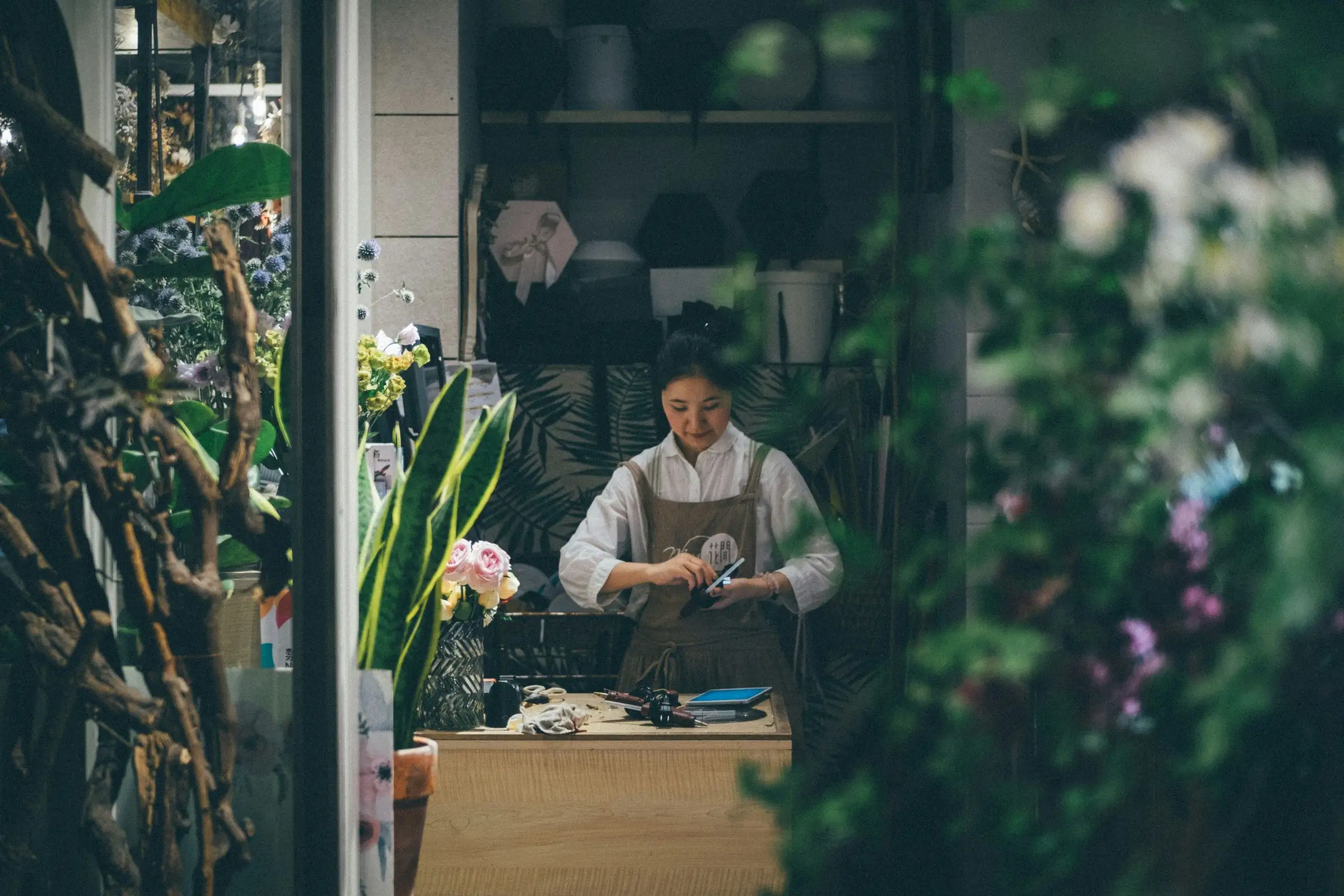 Small business owner at work in her shop